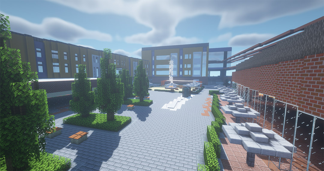 brick building and trees in a courtyard built in the game Minecraft.