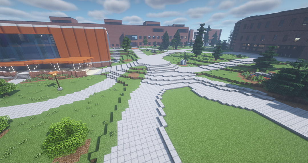 three brick buildings and a courtyard built in the game Minecraft.