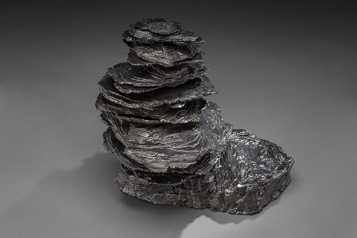 A multi-piece sculpture modeled after rock cairns in the Adirondack Mountains.