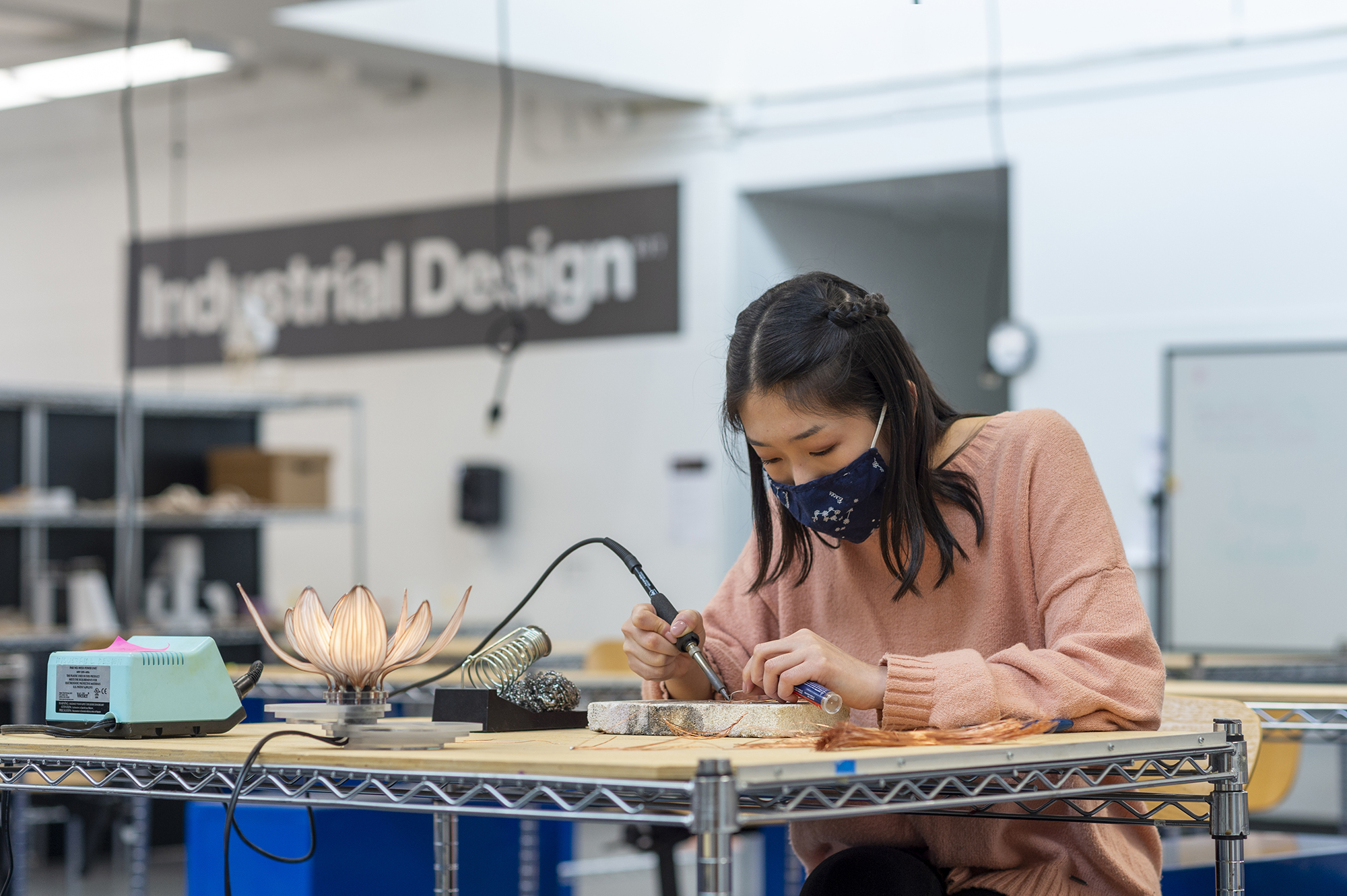 May Ren works on product designs at her desk.