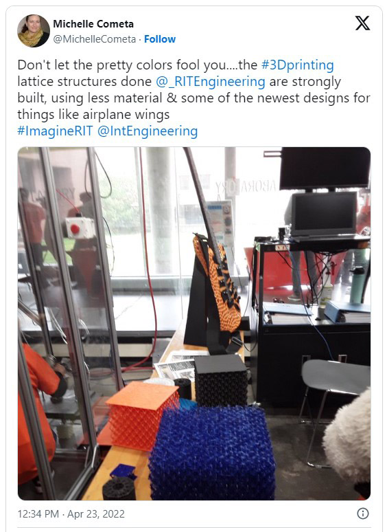 Tweet from Michelle Cometa on April 23, 20 22, with a photo of 3 D printed structures and the text, Don't let the pretty colors fool you....the 3 D printing lattice structures done at R I T Engineering are strongly built, using less material and some of the newest designs for things like airplane wings 