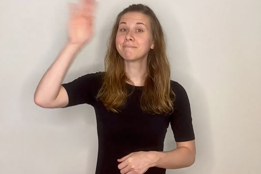 woman using American Sign Language.