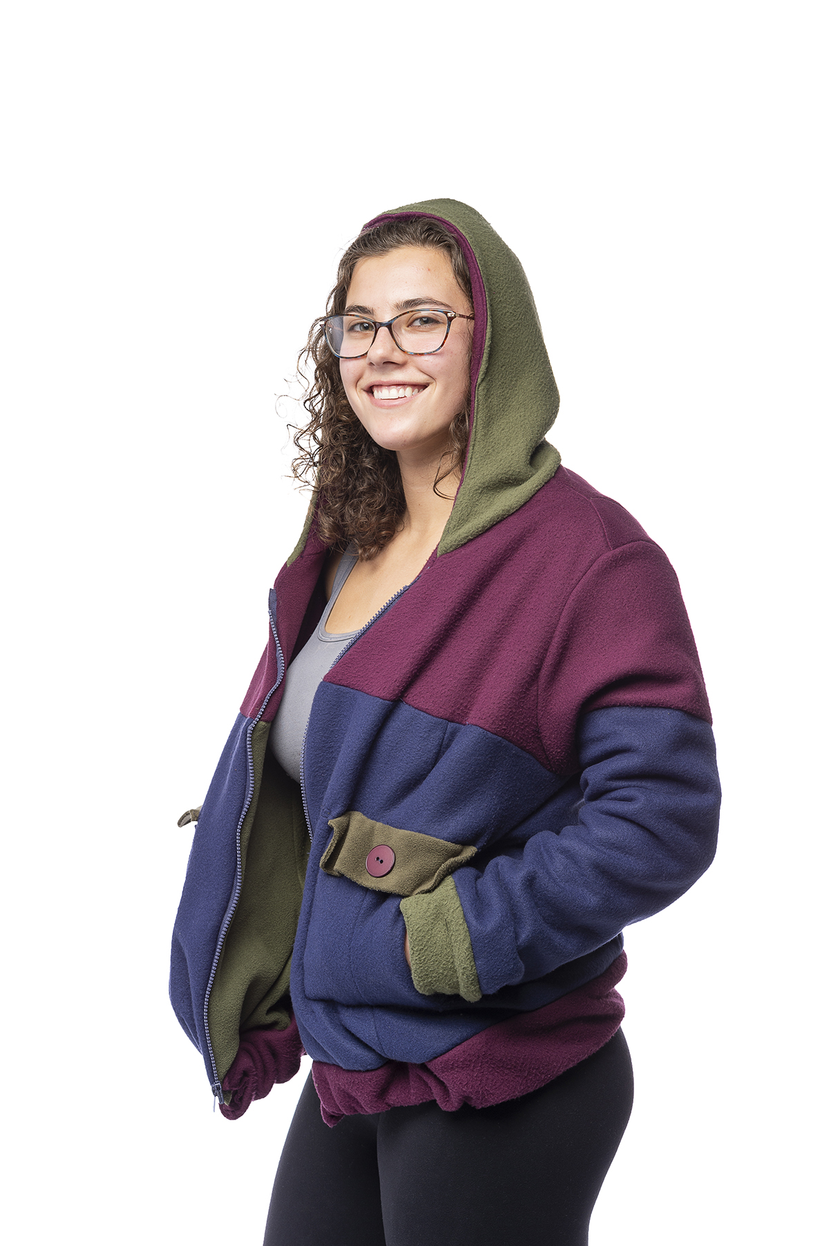 A hoodie design with shades of blue, magenta and green.