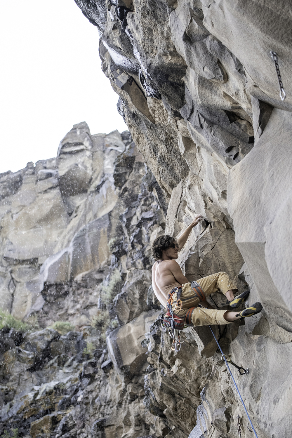 A person rock climbs in Oregon.