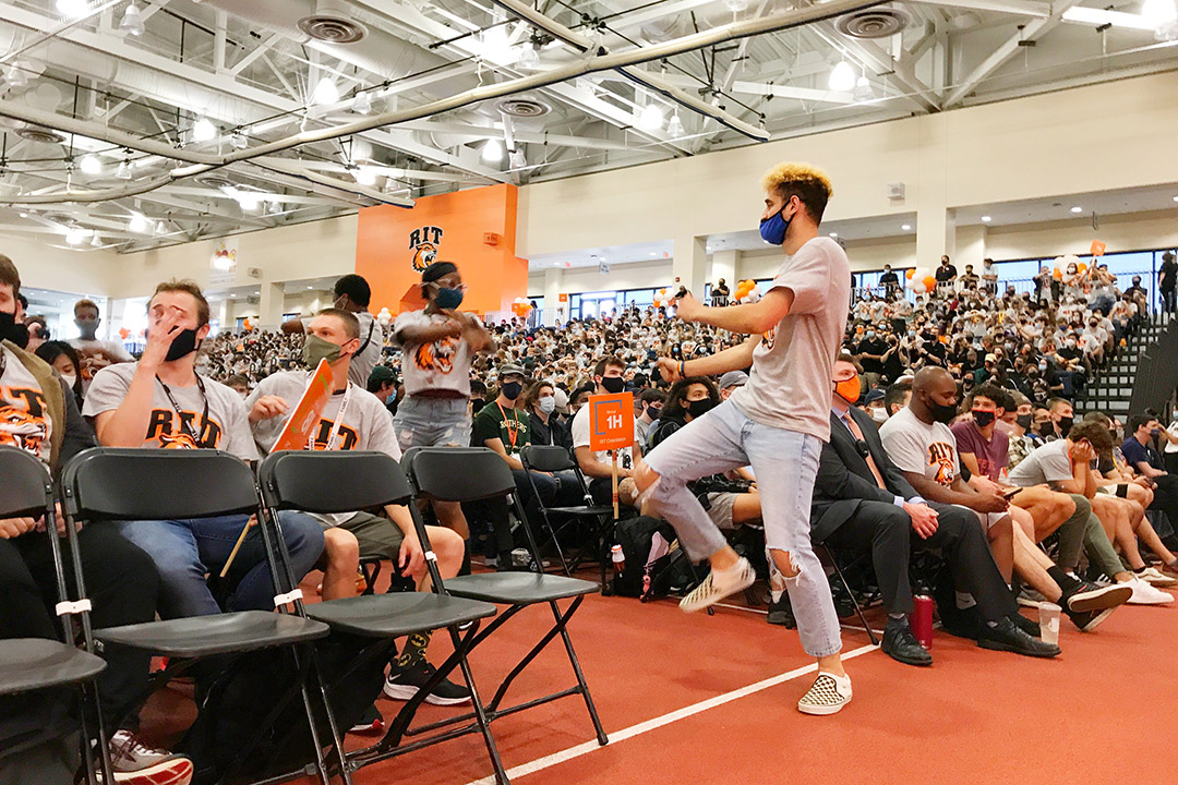 students gathered in field house for convocation.