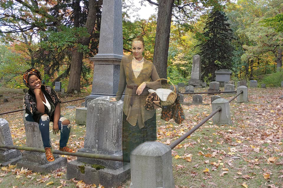 two people appearing in a cemetery via green screen special effects.