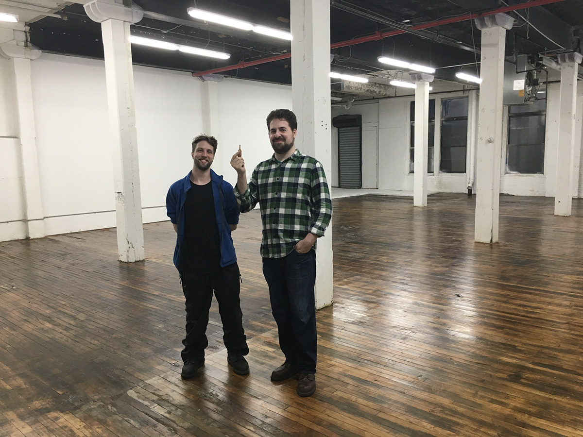 Adam Richlin and business partner David Finn in their office space.