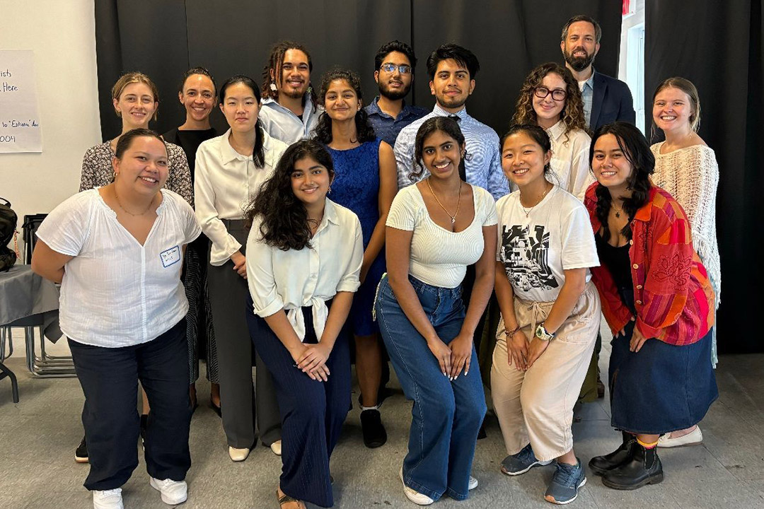 Ericka Chen poses with fellow interns and staff of the New York Climate Exchange.