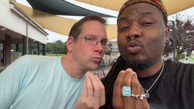  Joseph Fox and Christopher Coles are seen sitting next to each other in a selfie style photo.