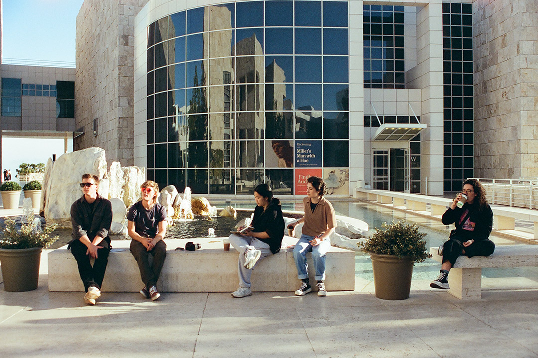 Students are pictured taking a rest outside of The Getty Center