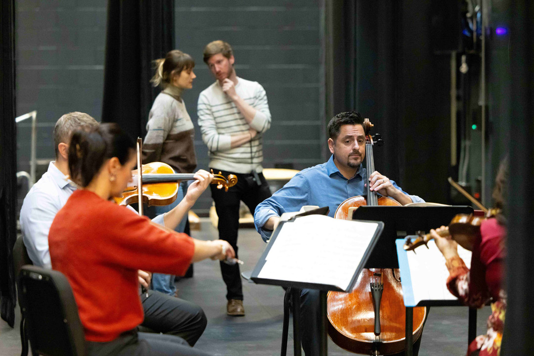 acoustic consultants listen to a string quartet from the Rochester Philharmonic play