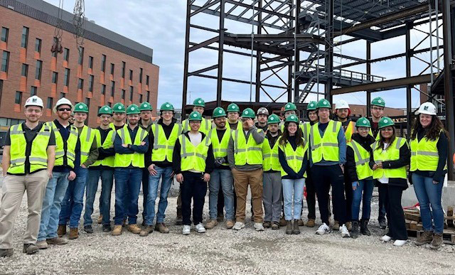 a group of students in construction gear