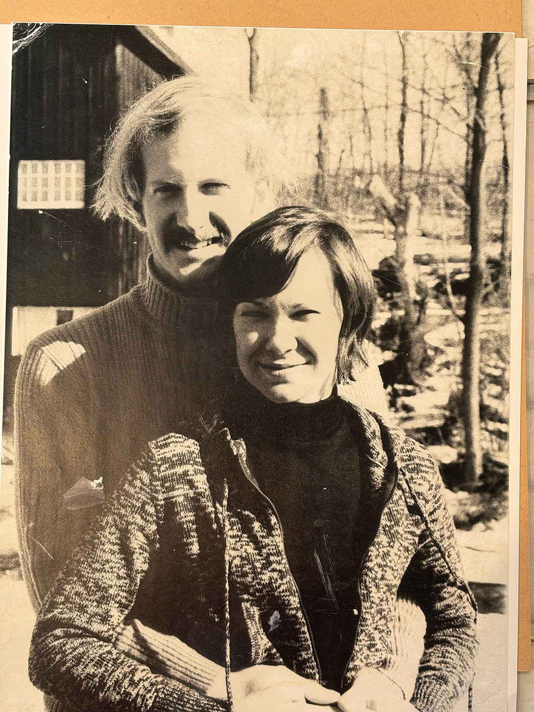 Sue and Bob Mathers appear in an old amber colored photograph.