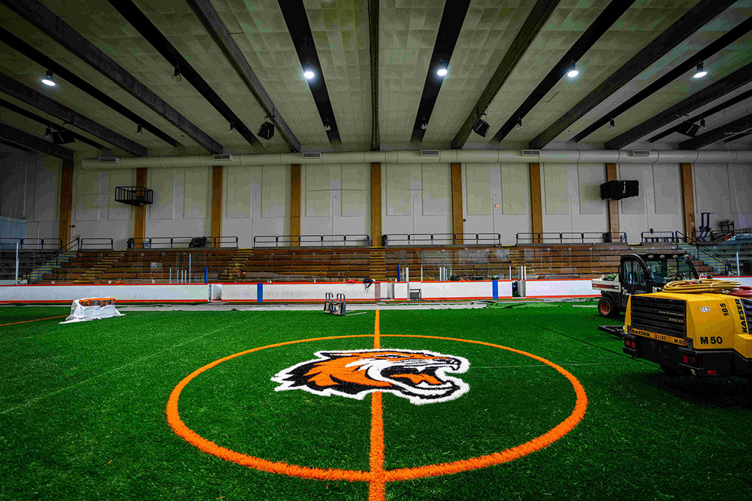 a birds eye view of an indoor lacrosse turf.