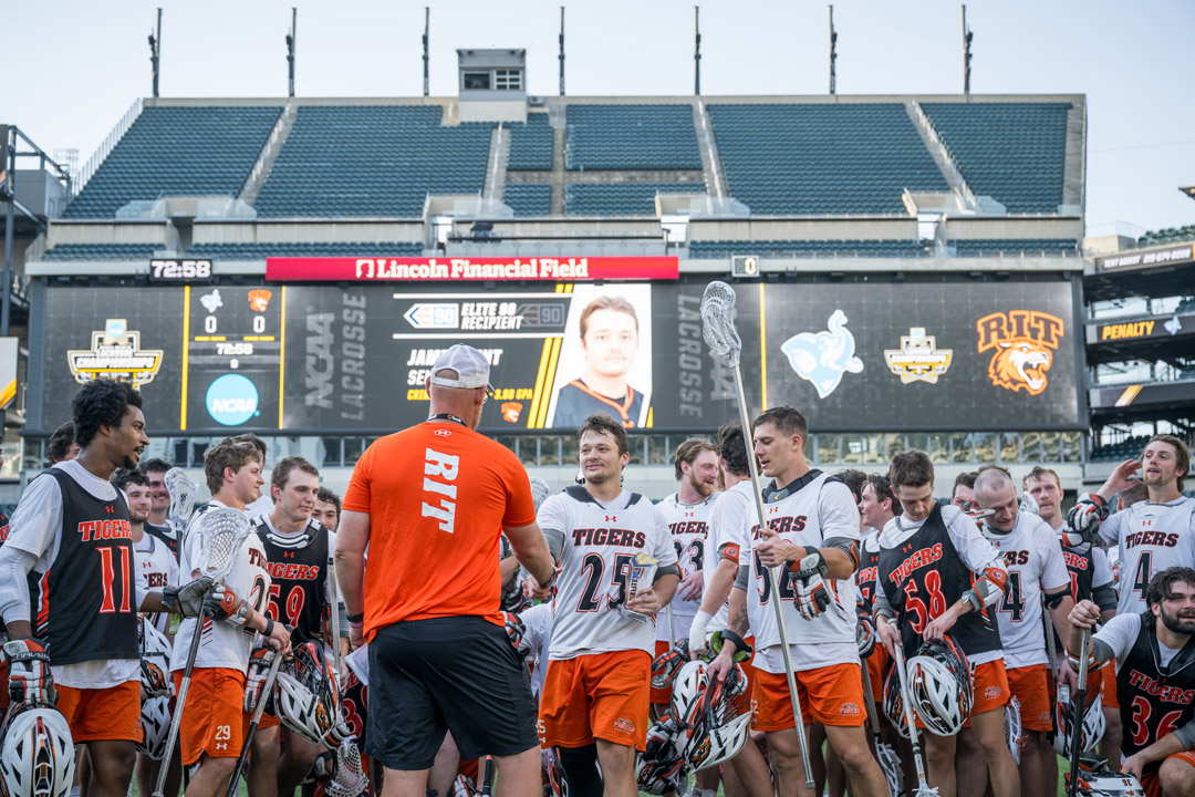RIT graduate defenseman and team co-captain Jamie Hunt, center, is no stranger to the NCAA championship game, having been to the 2021, 2022, and 2024 contests.