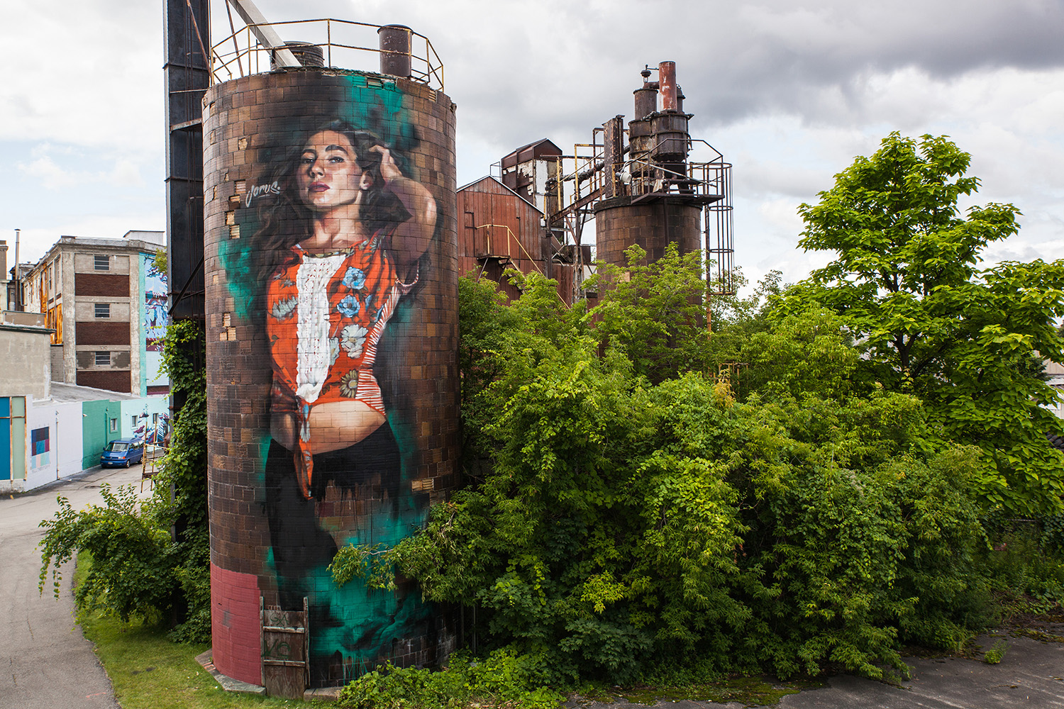 Mural on a silo of a woman