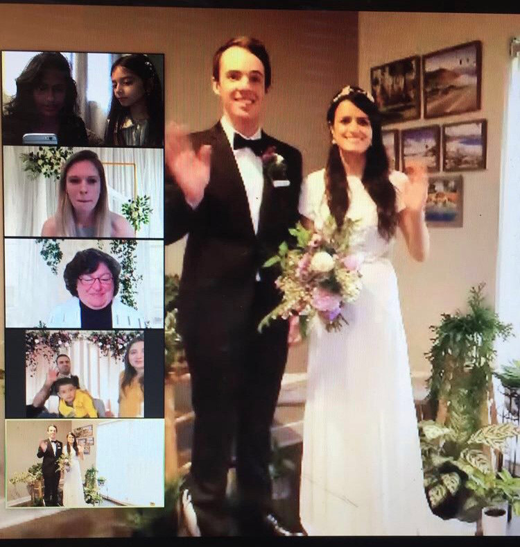 screenshot of people viewing wedding on Zoom.