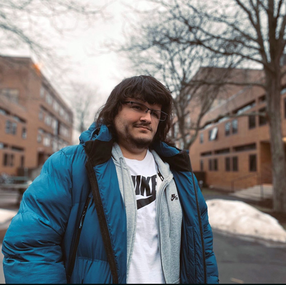 environmental portrait of college student Zach Sheikh.