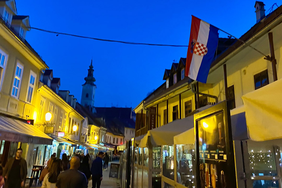 a street in Zagreb, Croatia, at night.