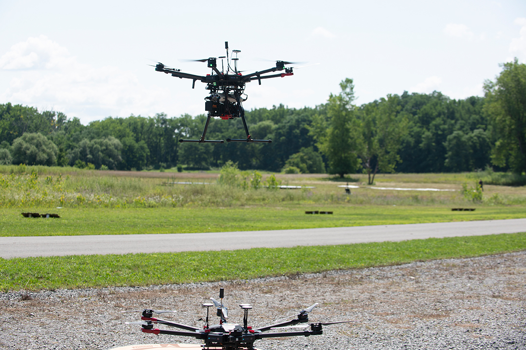 Two drones take flight.