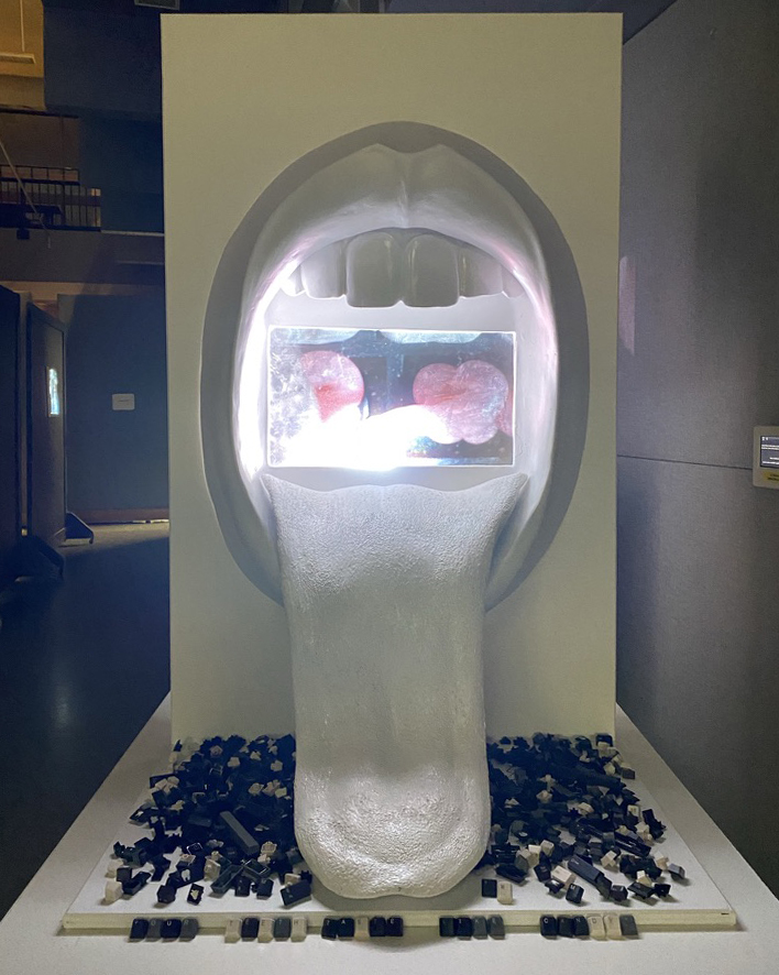 An installation of a mouth and tongue.