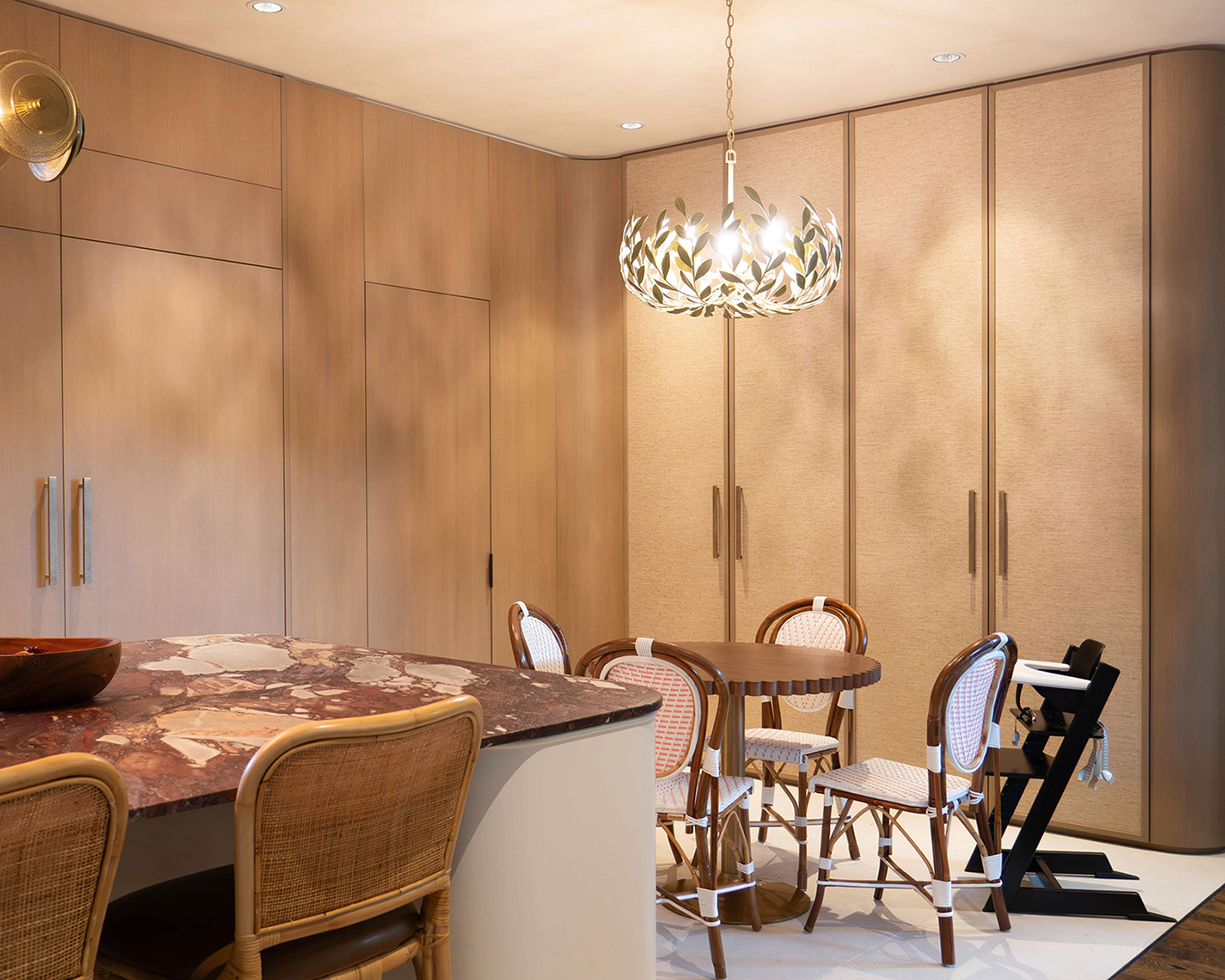 Kitchen table and built in storage solutions in a luxury home.