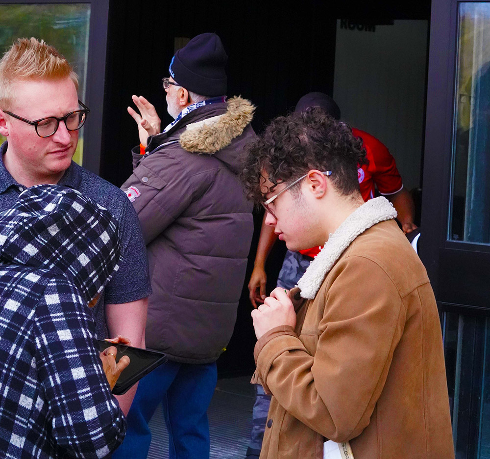 people communicating in American Sign Language.