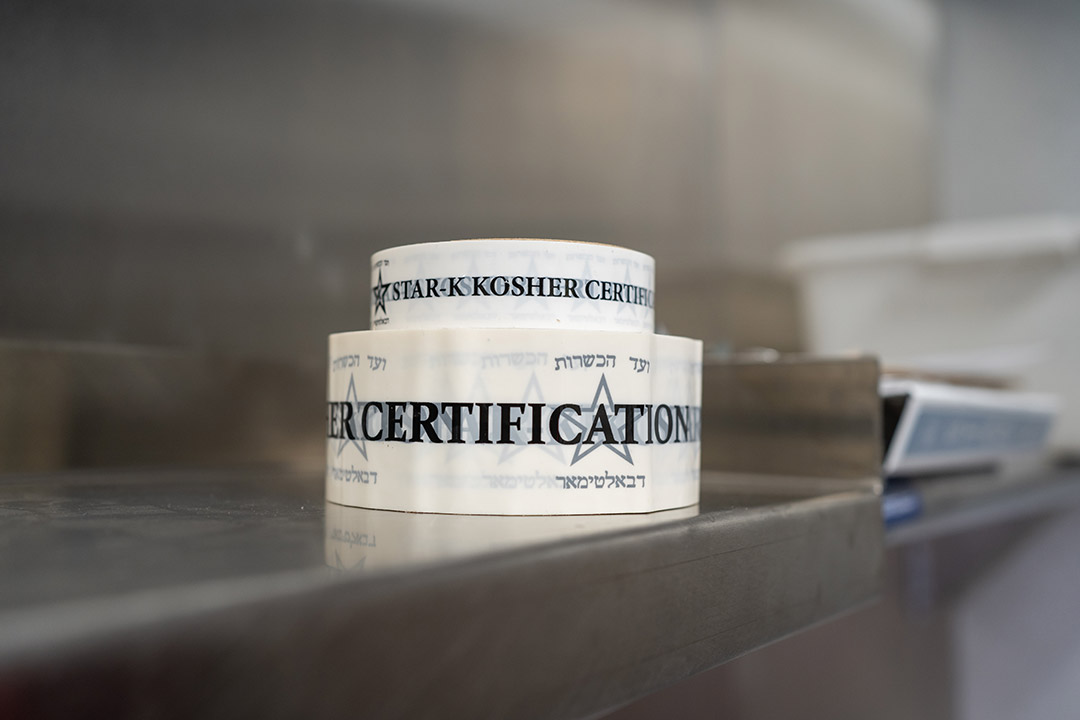 two rolls of tape stacked on top of each other, both with the words star K kosher certification.