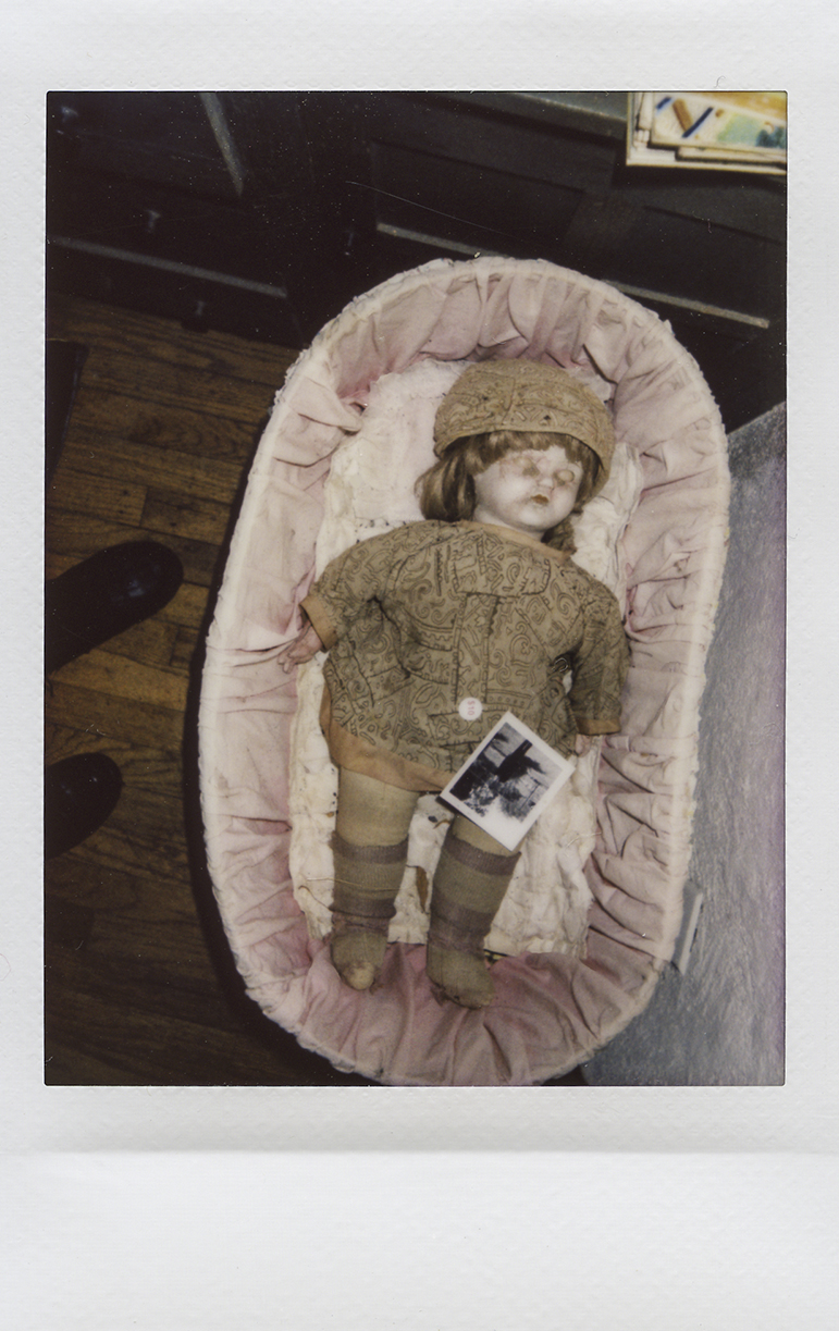 a photo of a doll. This is one of several images by Alexandra Gataeva featured in photo exhibitions around the world.