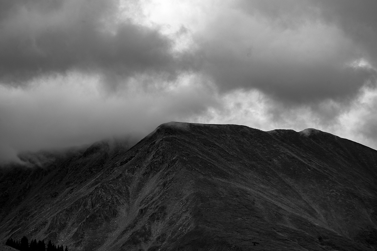 A mountain with clouds overhead. This is one of several images by Alexandra Gataeva featured in photo exhibitions around the world.