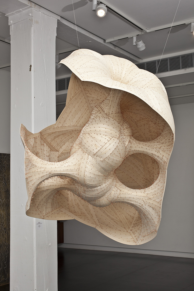 The artwork hanging from a ceiling