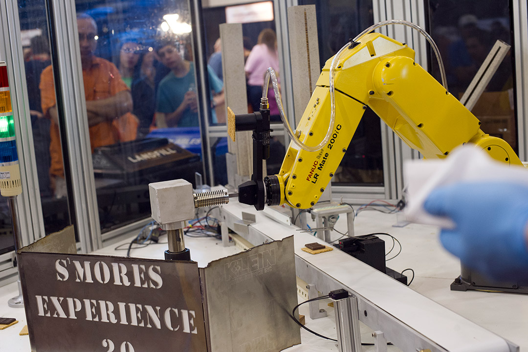 robotic arm roasting a marshmallow.