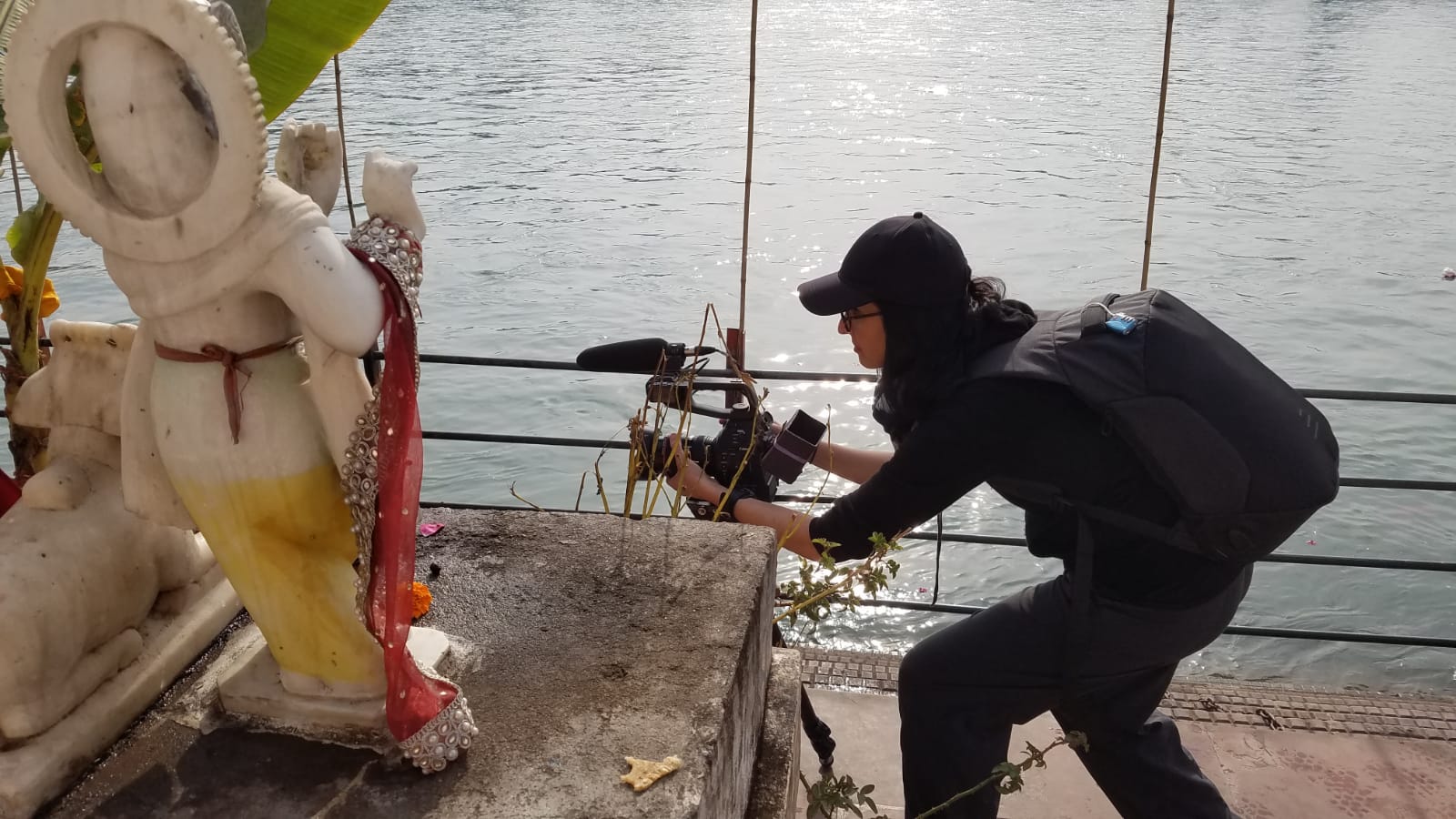 Shanti Thakur shoots a scene on a boat for her documentary.