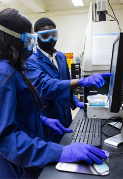 Nana and Niaya working in a chemistry lab