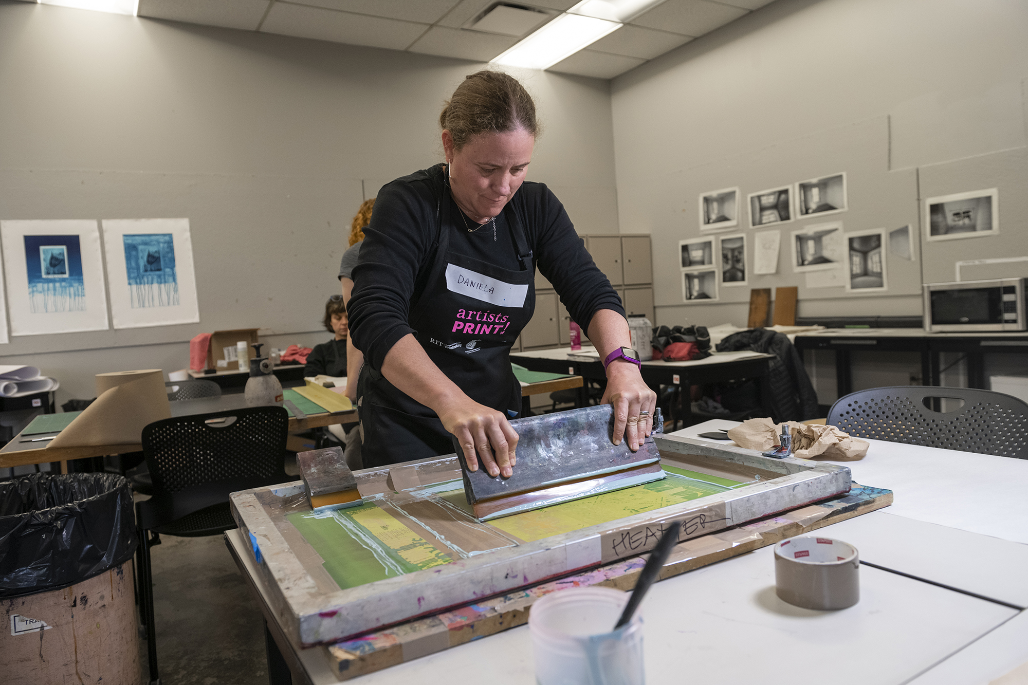 Daniela Marx works on a print.