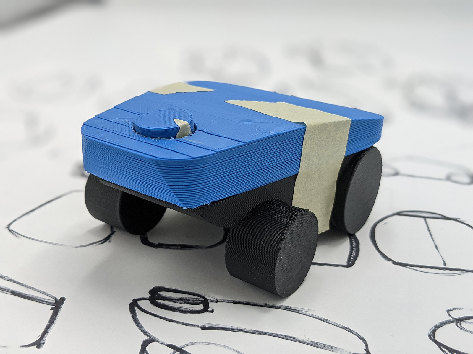 A blue robot that mimics the look of a truck.