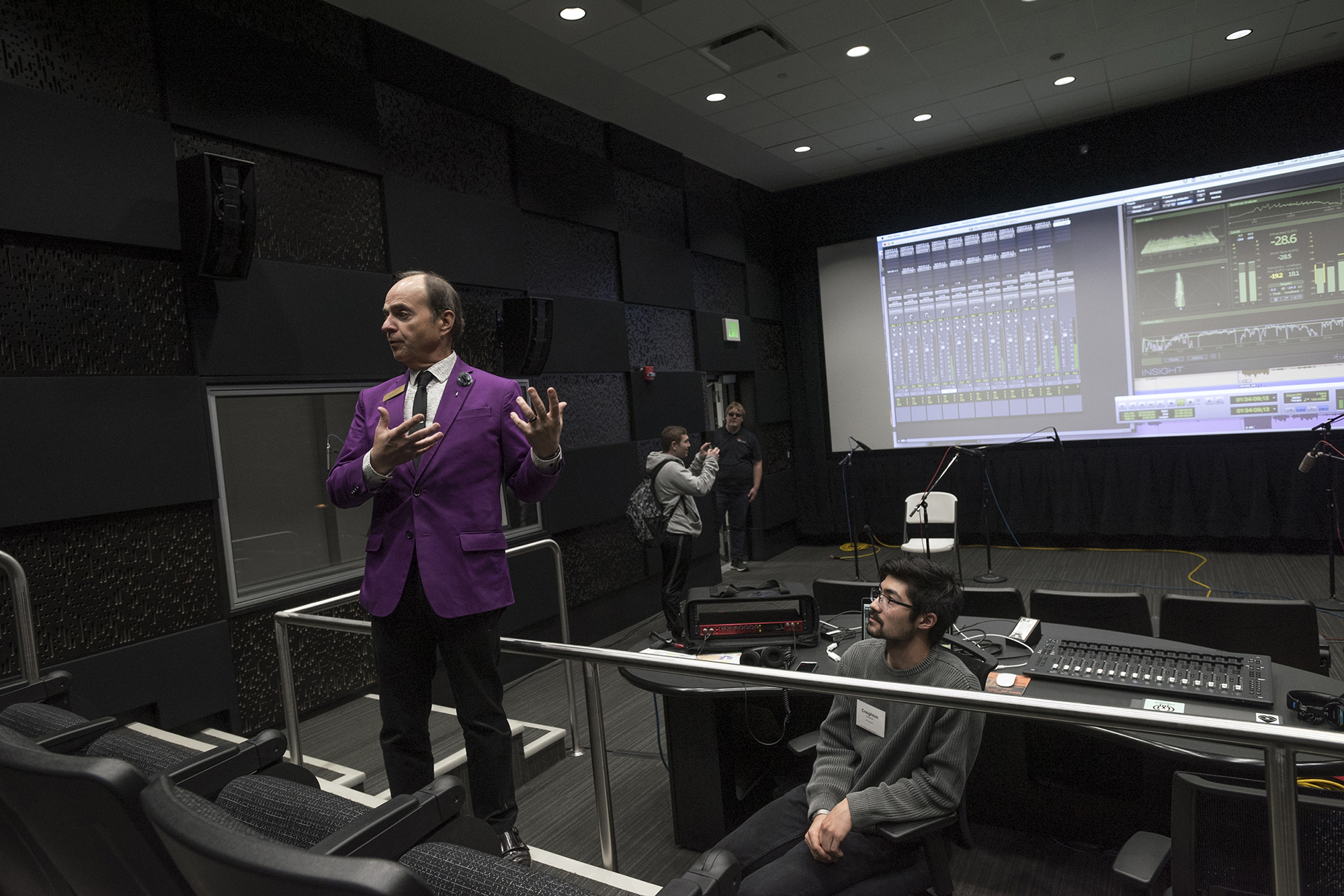 Dave Sluberski presents in MAGIC Spell Studios' sound mix theater as Creighton Yanchar sits behind the controls.