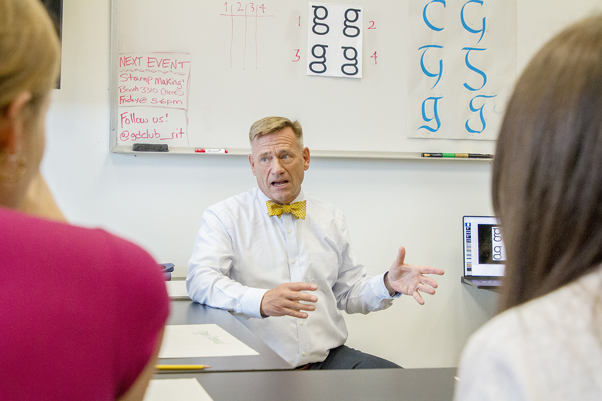 Steve Matteson talks with students.