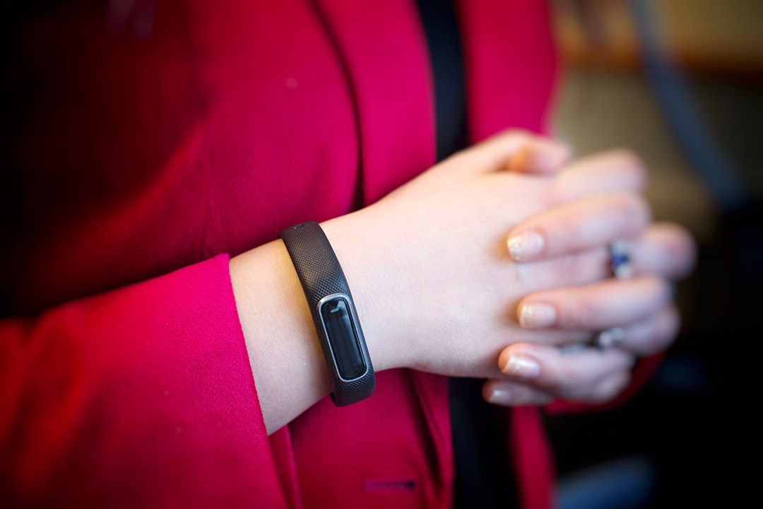 Fitbit bracelet on researcher's wrist.