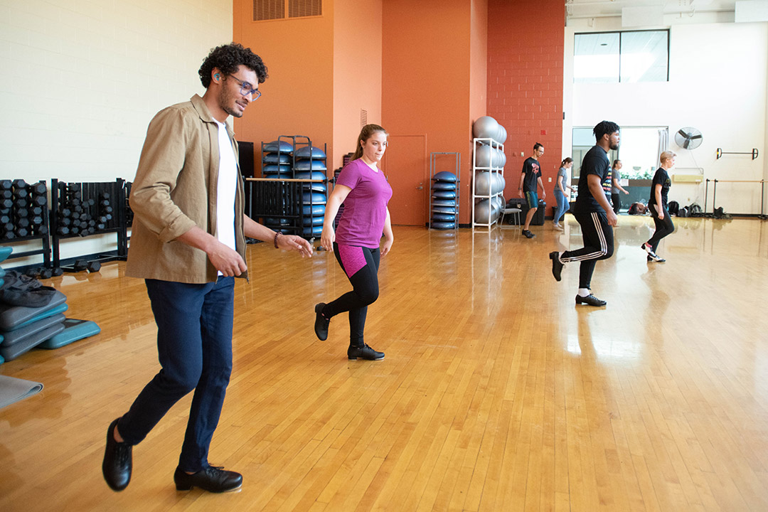 students tap dancing.