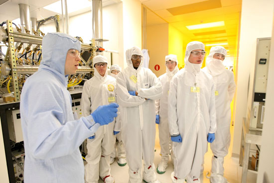 Researchers working in lab