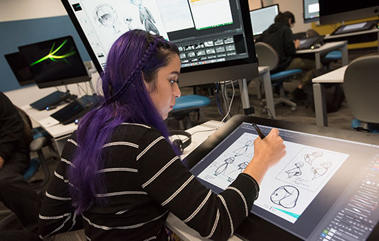 person drawing sketches in 2d animation lab.
