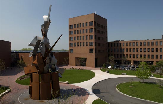 Picture of classroom buildings and statue