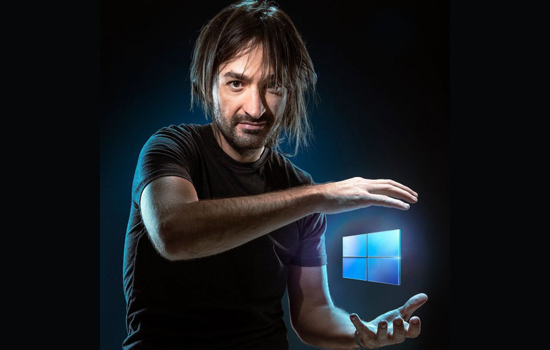 Person posing with Microsoft logo