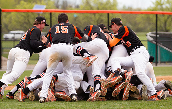 RIT baseball team in a dog pile.