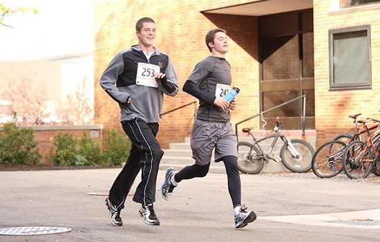 Two people running in marathon 