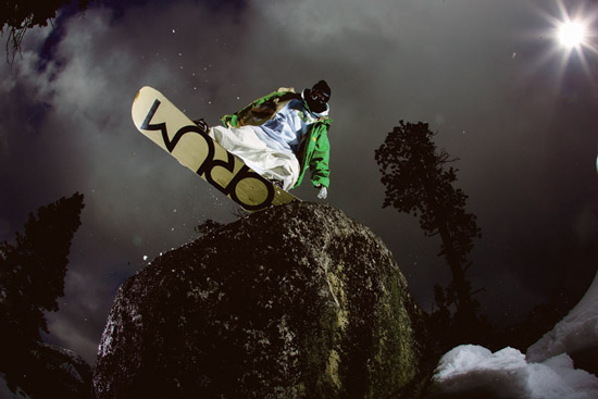 Snowboarder on rock