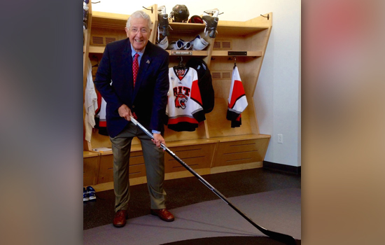 Person holding hockey stick