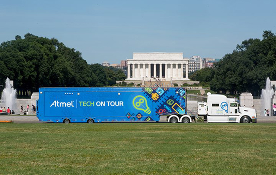 Bus parked in front of monument 