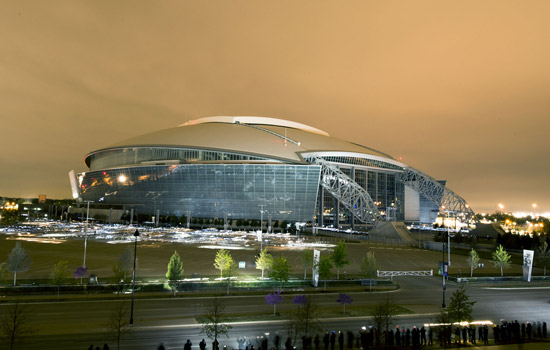 Picture of stadium lit up at night